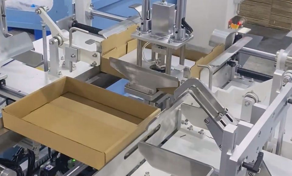 An automatic carton erector built with CNC-machined components