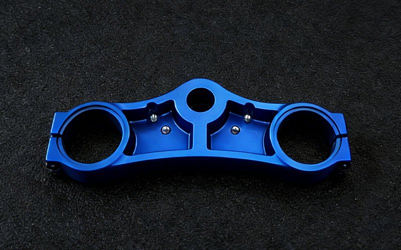 Blue-anodized-CNC-motorcycle-prototype-part-made-from-7075-aluminum.