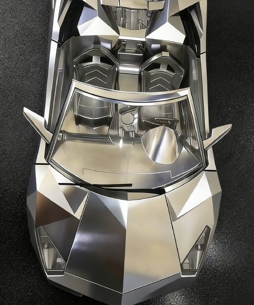 5-axis CNC machined aluminum automotive scale model exhibiting complex freeform surfaces for design verification.