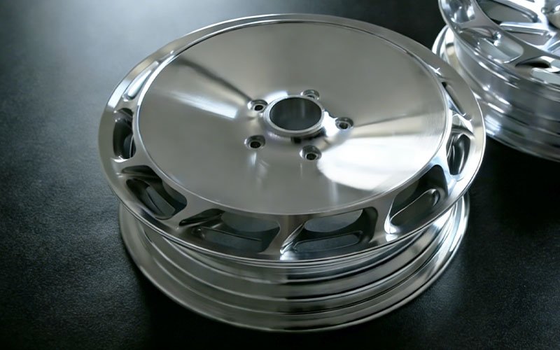 Custom CNC machined 6061-T6 aluminum wheel with high-gloss mirror polished finish