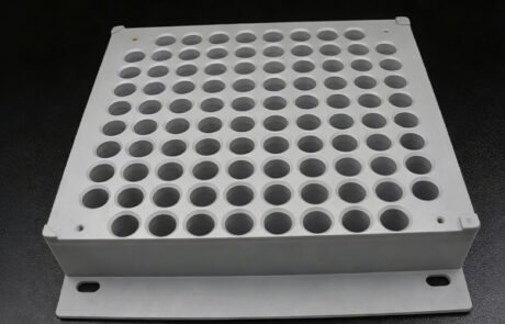 Angled view of Custom Dry Bath Block CNC Machining in aluminum