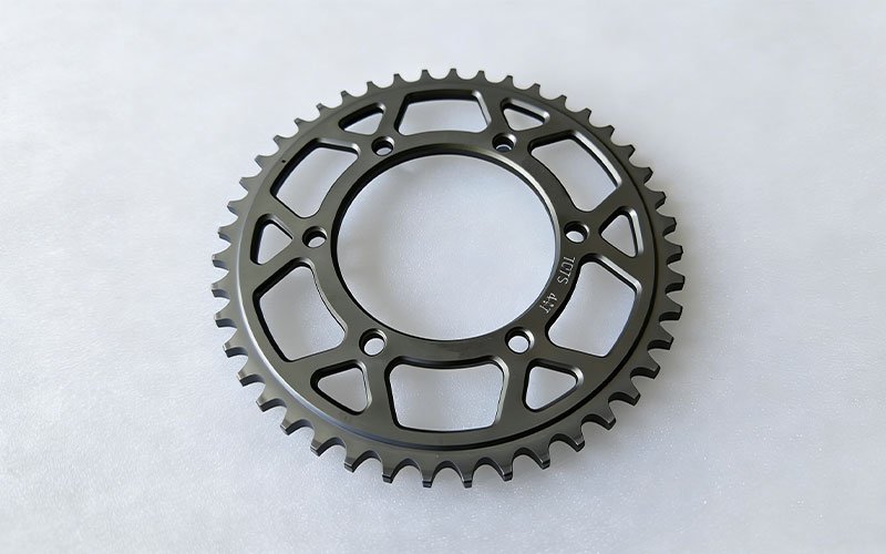 CNC machined bicycle chainring made of Aluminum 7075-T6 with 44 teeth and hard anodized finish.