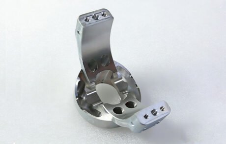 5-axis CNC machined aluminum motor mount bracket with curved U-shape design for automation.