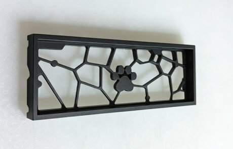 Custom CNC machined aluminum keyboard frame with cat paw design, made from Aluminum 6061 with black anodized finish.