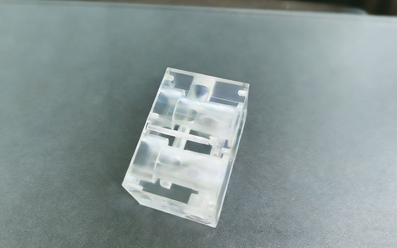 Standard “As-Machined” Finish. Standard CNC machined acrylic(PMMA) part showing a cloudy, frosted surface finish and visible tool marks without polishing.