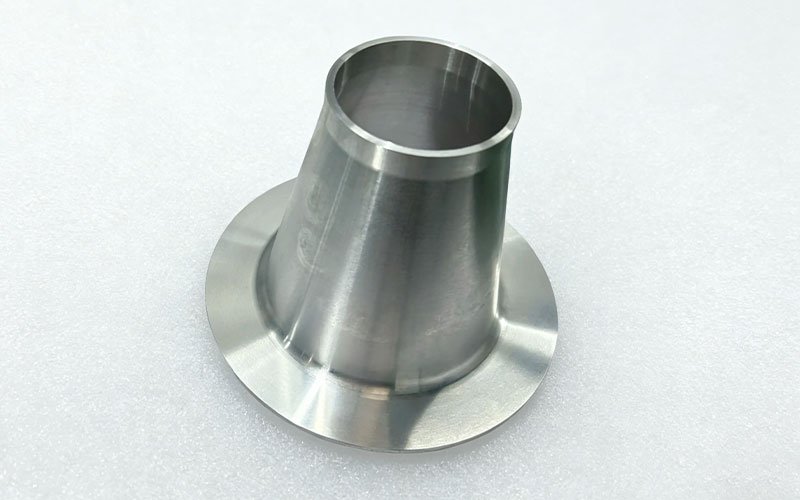 Precision thin-wall CNC turned conical component made of aluminum with a flanged base.
