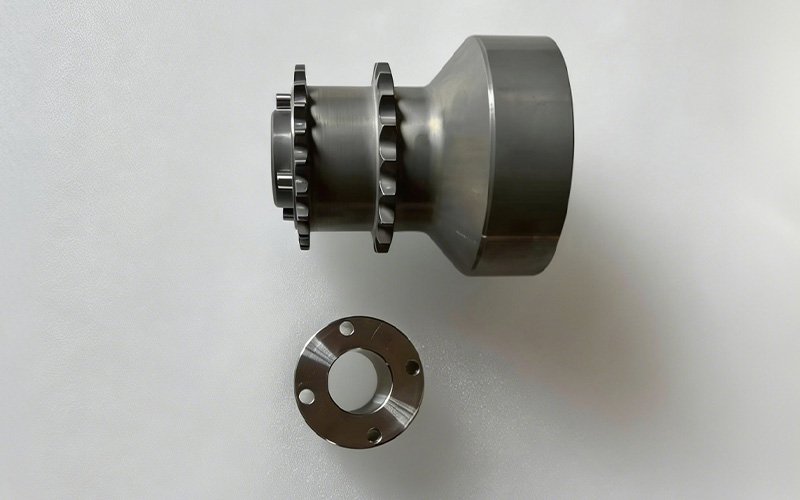 Side profile of a 4-pinned crank hub upgrade with a nitrided surface finish, featuring four precision press-fit dowel pins.