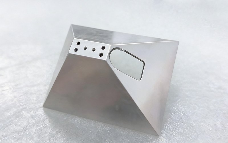 External view of a custom CNC machined aluminum shielding cover with a side cutout.
