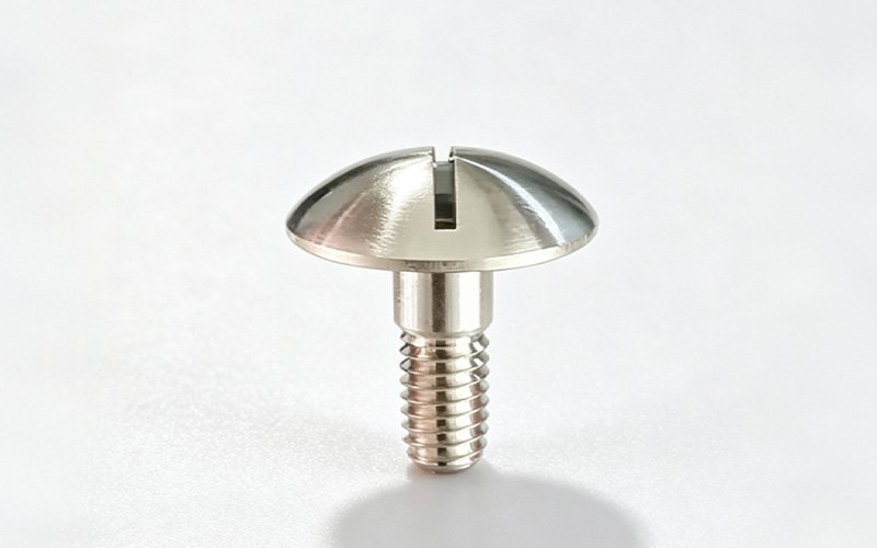Custom CNC machined stainless steel mushroom head screw with a domed slotted head and external thread