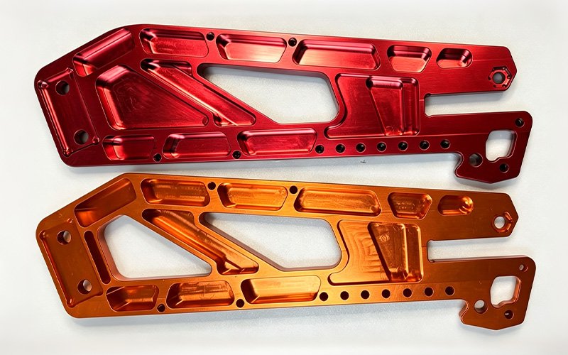 Ribbed and pocketed underside of a custom CNC machined motorcycle swingarm.