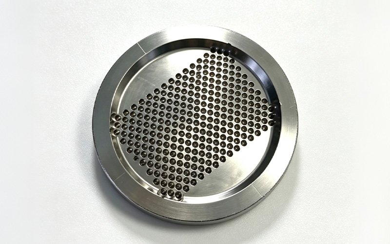 Custom spinneret plate with a machined hole array and laser-cut 0.02mm slits