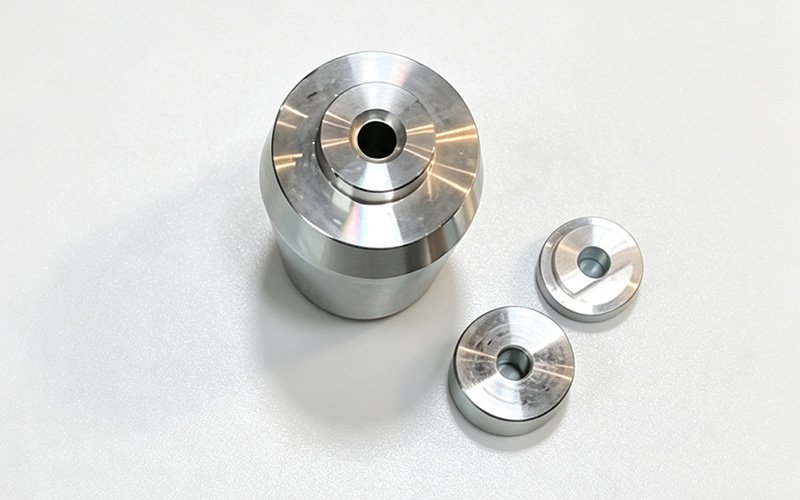 Custom CNC-turned stainless steel bar end weight with two spacers, 350 g total