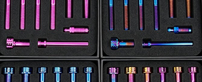 Kit of custom anodized titanium motorcycle bolts in multiple colors