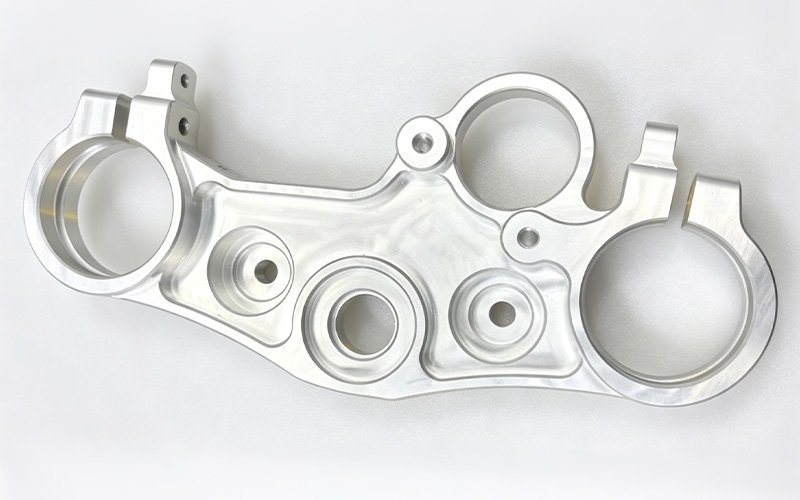 Custom top triple clamp machined to fit Ducati 1299 forks on a Yamaha MT09, 7075-T651 aluminum